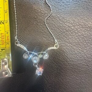 Elegant Silver Necklace with Sparkling Stones with earrings